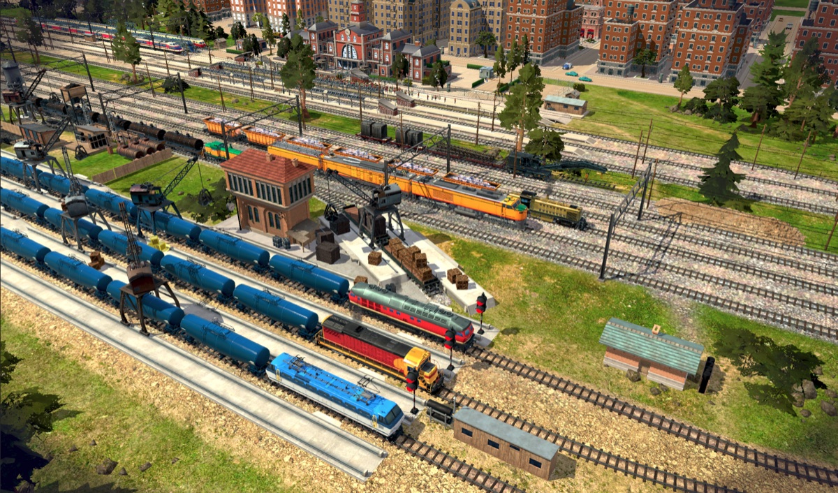 TrainStation 3 — freight yard with tank wagons, loading cranes and city buildings